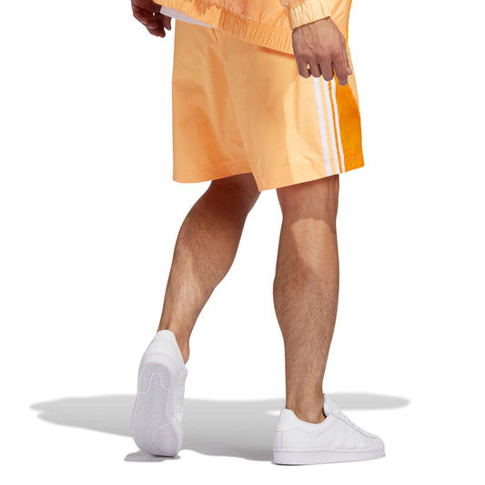 Calções Adidas Laranja com Riscas Brancas