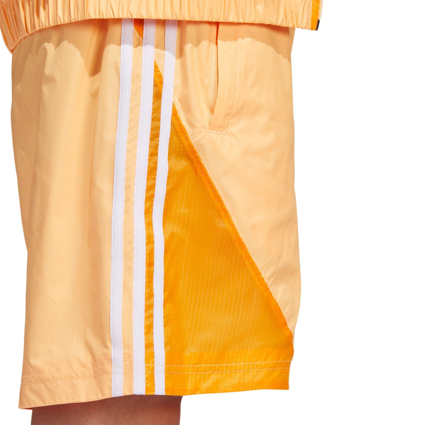 Orange Adidas Shorts with White Stripes